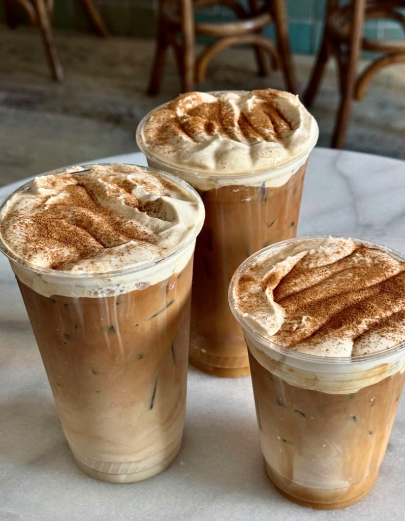 aesthetic coffee glass cup with iced coffee